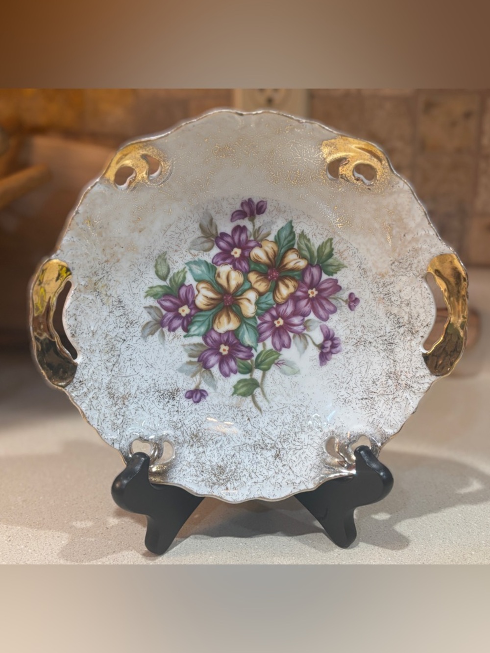 A vintage Trimont Ware Japan floral violet scalloped plate
